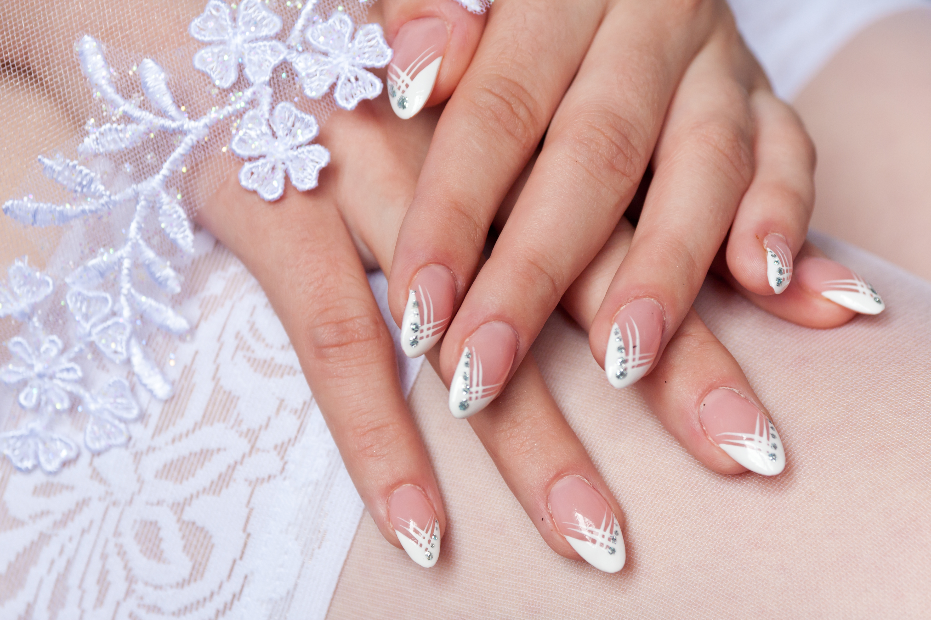 Bride's manicure on lace stockings