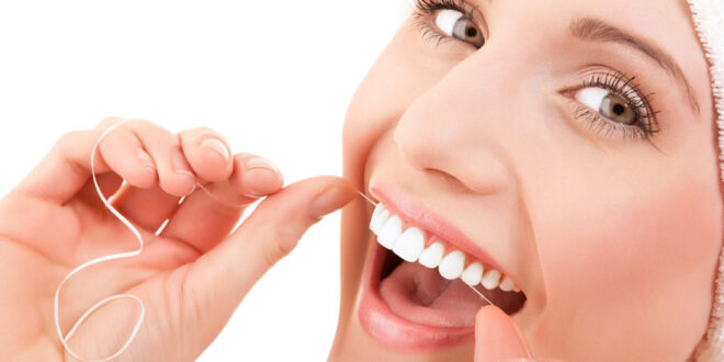 Как правильно чистить зубы нитью